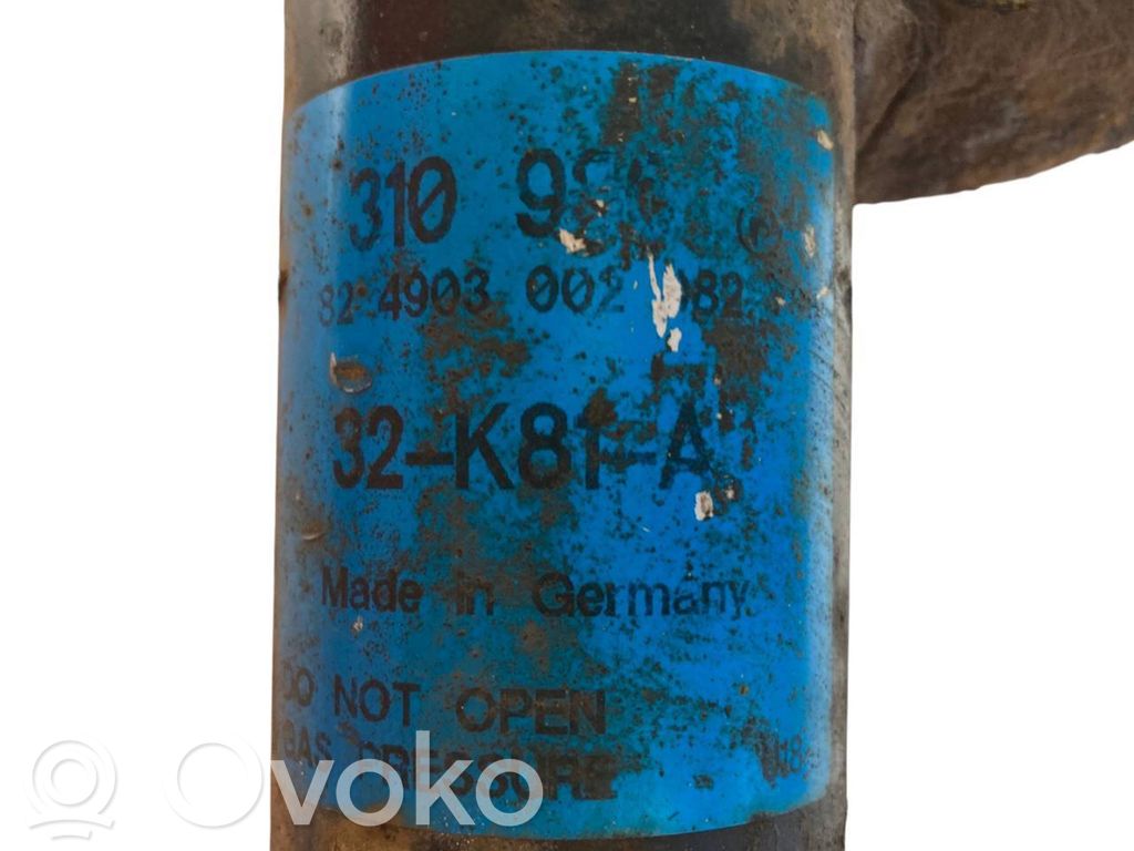 Priekšpusē amortizators ar atsperi