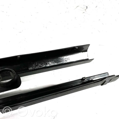 Front passenger seat rail decorative trim