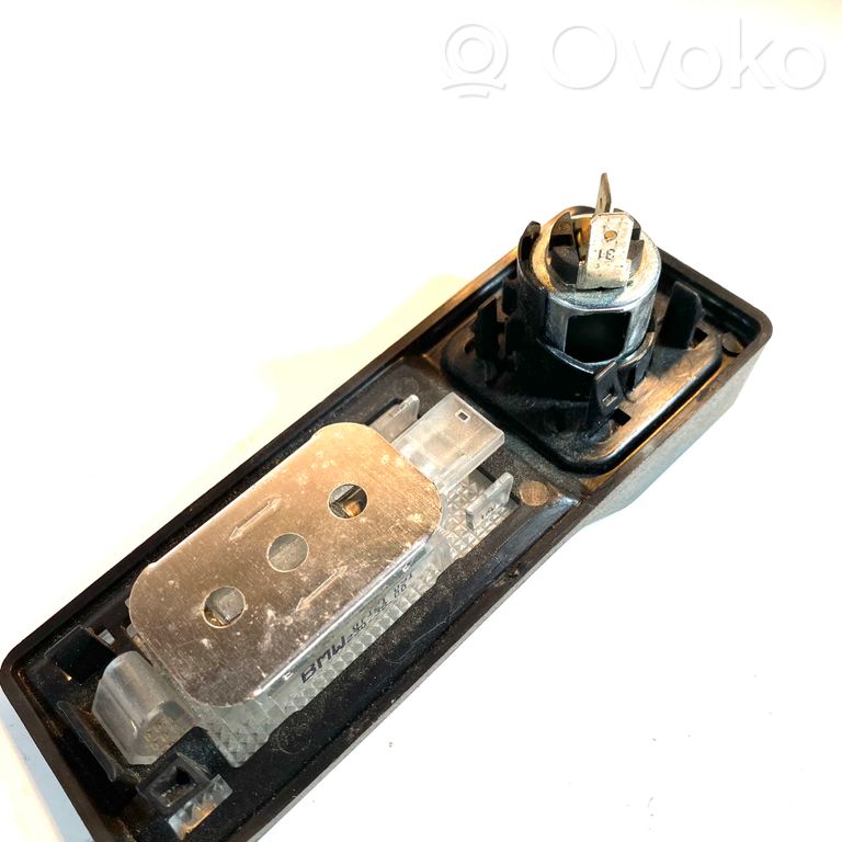 Cigarette lighter in the rear
