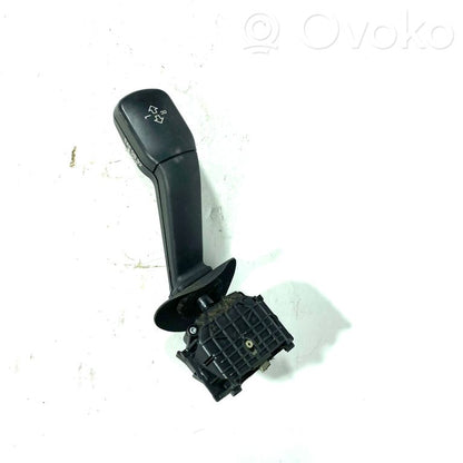 Turn signal/headlight lever