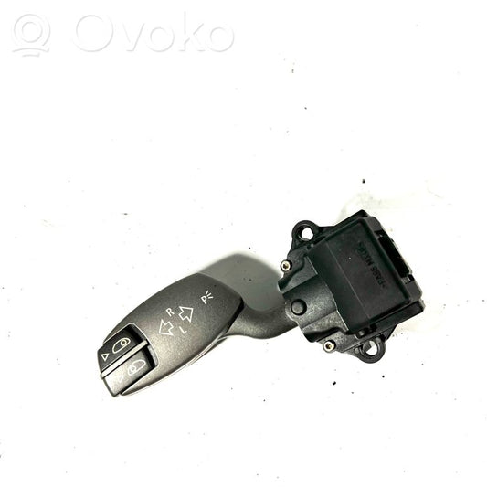 Turn signal/headlight lever