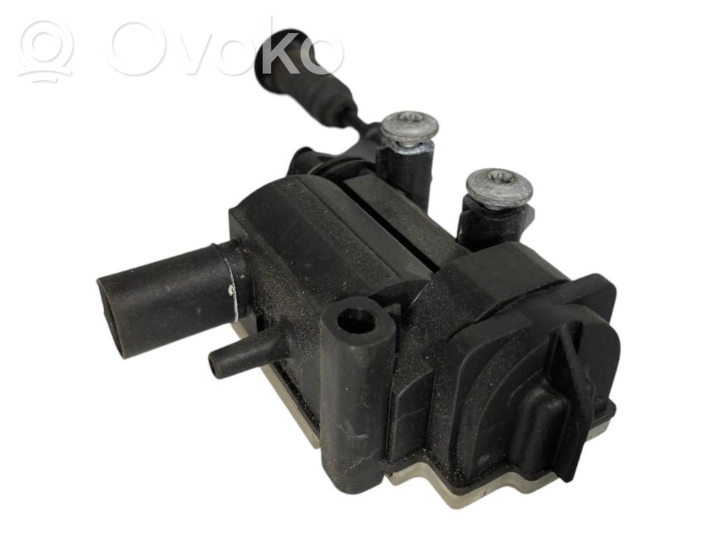 Electric fuel tank lock