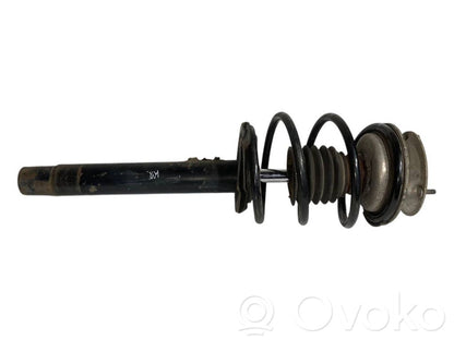 Priekšpusē amortizators ar atsperi