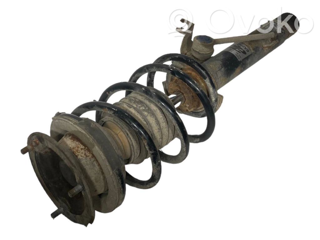 Priekšpusē amortizators ar atsperi