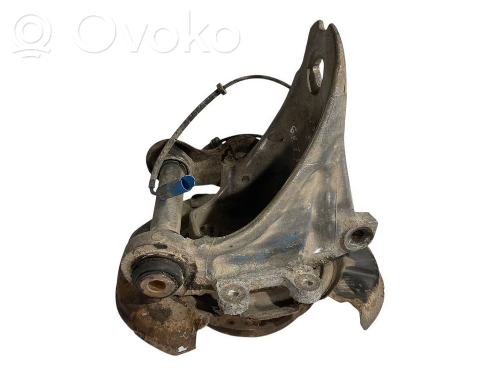 Aizmugurē riteņa rumbas vārpstas šarnīrs (stupica, capfa)