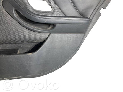 Apšuvums aizmugurējām durvīm