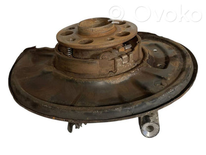 Aizmugurē riteņa rumbas vārpstas šarnīrs (stupica, capfa)