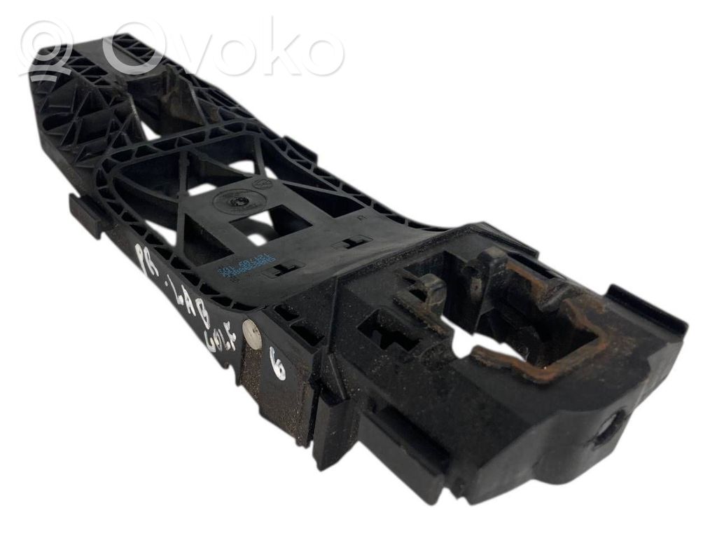 Priekšpusē turētājs / kronšteins ārējam atvēršanas rokturim