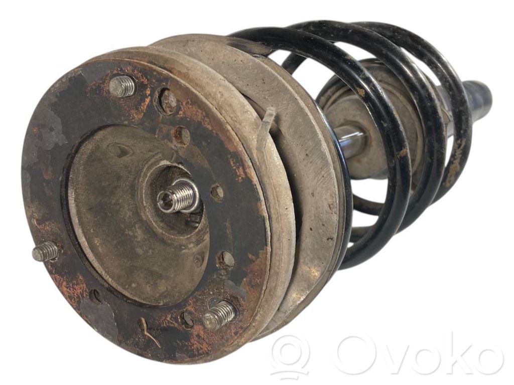 Front shock absorber with spring