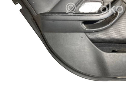 Apšuvums aizmugurējām durvīm