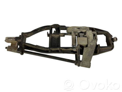 Holder/bracket for external opening handle at the front