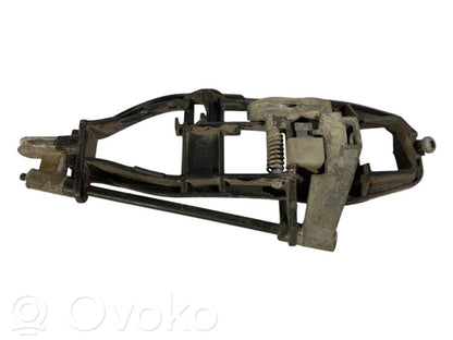 Holder/bracket for external opening handle at the front