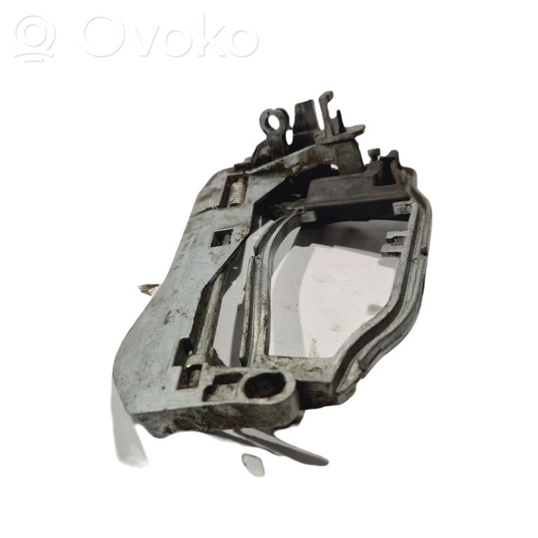 Holder/bracket for external opening handle at the front