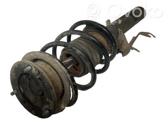 Priekšpusē amortizators ar atsperi