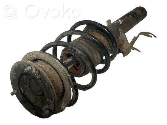 Priekšpusē amortizators ar atsperi