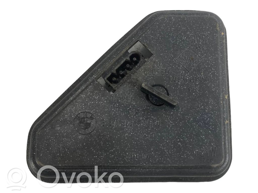 Aizmugures spuldzes vāka turētājs