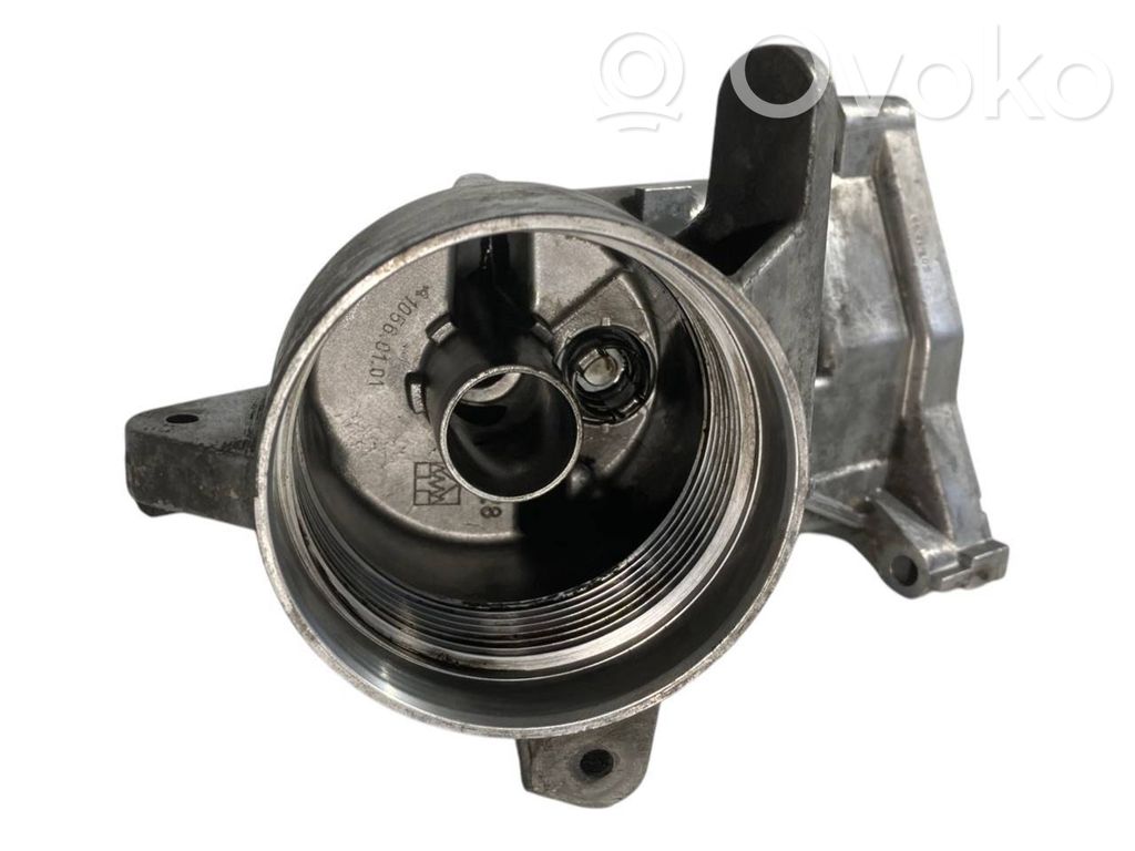 Oil filter holder/cooler