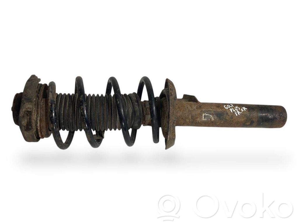 Priekšpusē amortizators ar atsperi