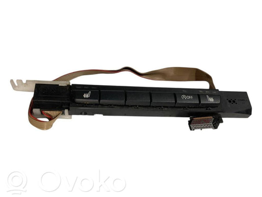 Sēdekļu apsildes slēdzis