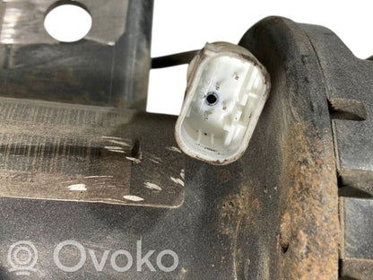 Front shock absorber with spring