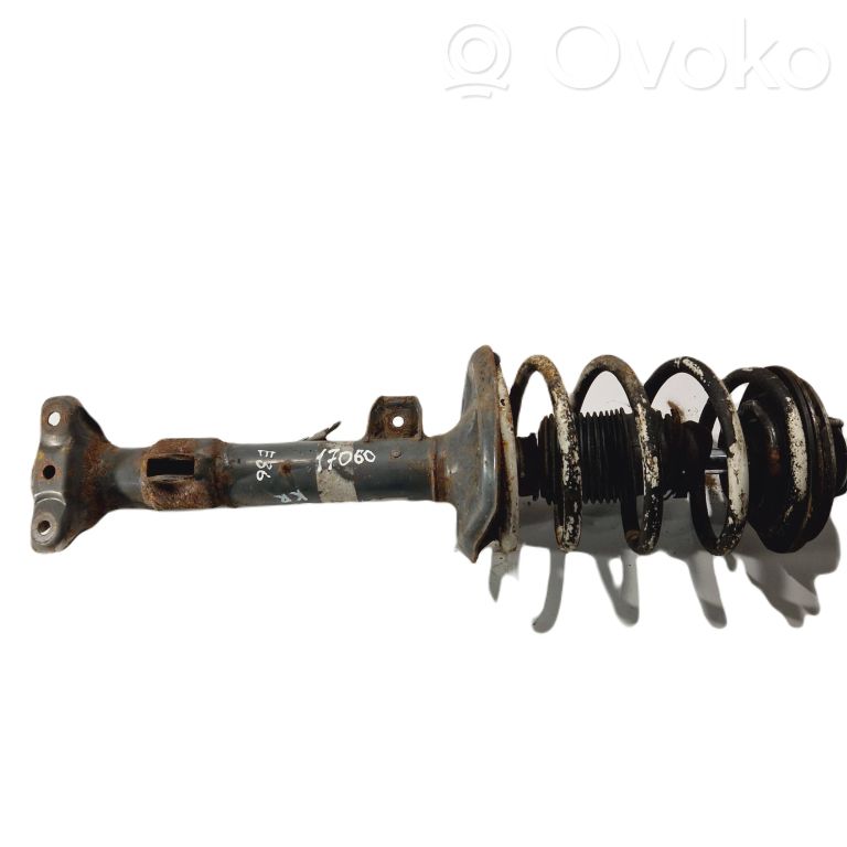 Priekšpusē amortizators ar atsperi