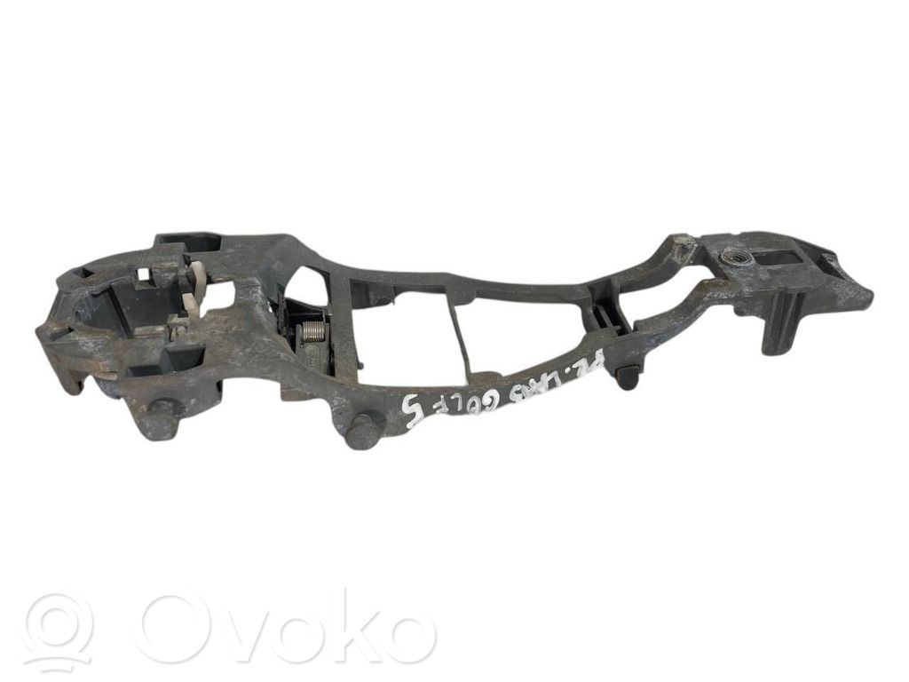 Priekšpusē turētājs / kronšteins ārējam atvēršanas rokturim