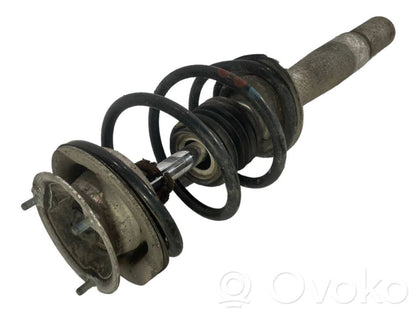 Priekšpusē amortizators ar atsperi