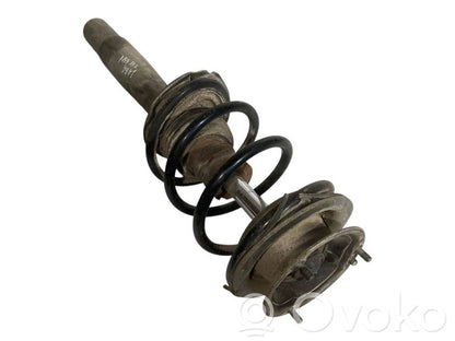 Priekšpusē amortizators ar atsperi