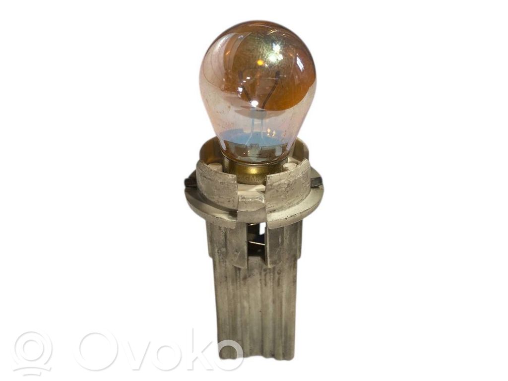 Aizmugures spuldzes vāka turētājs