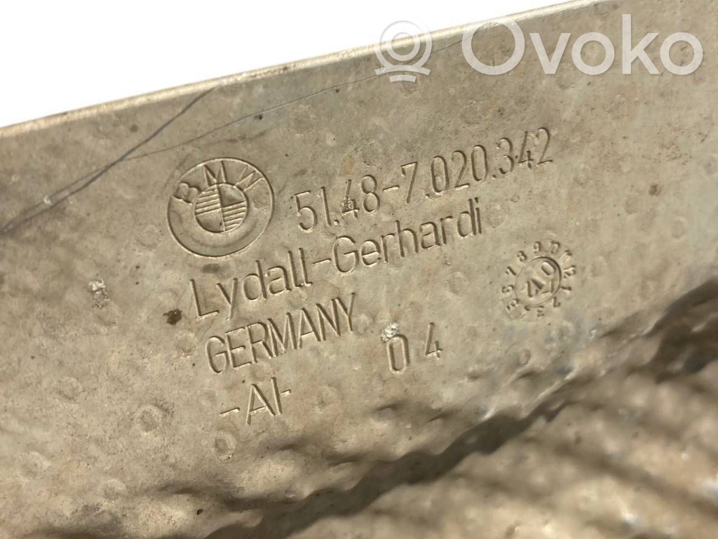 Under engine guard (front)