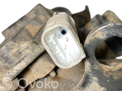 Front shock absorber with spring