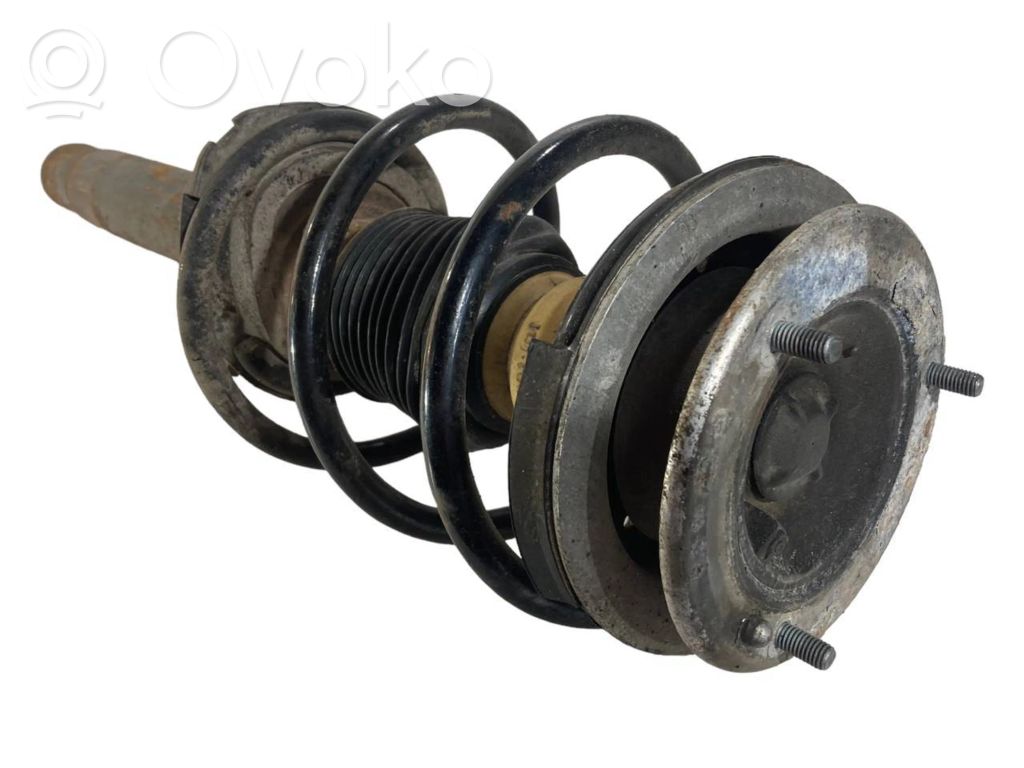 Priekšpusē amortizators ar atsperi