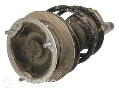 Priekšpusē amortizators ar atsperi