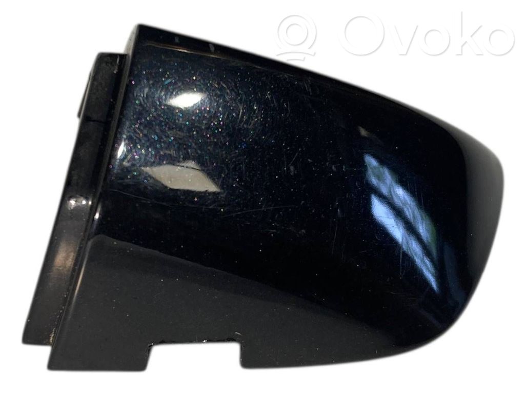 Priekšpusē durvju roktura vāciņš