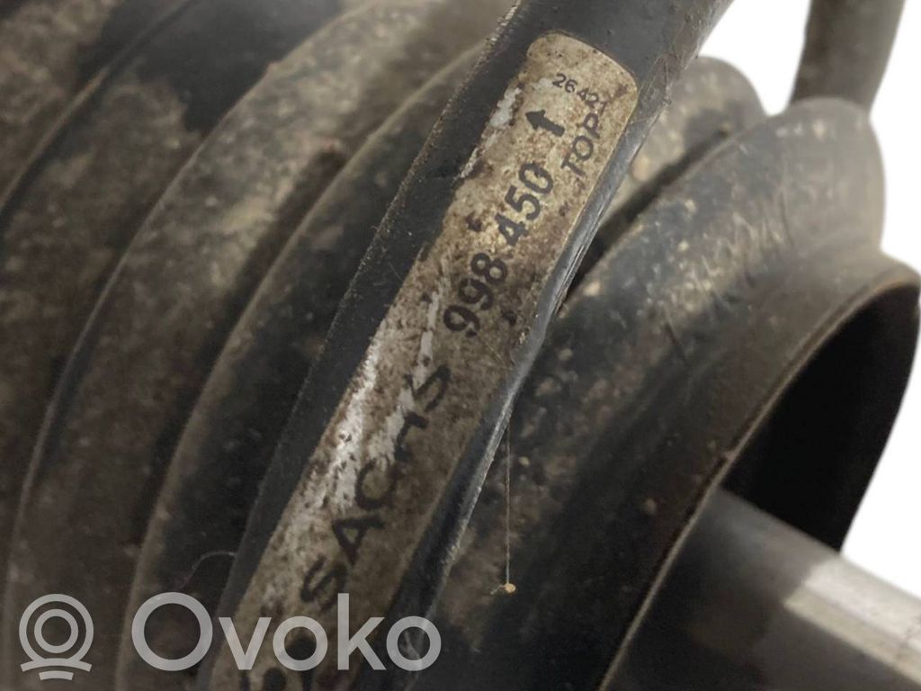 Priekšpusē amortizators ar atsperi