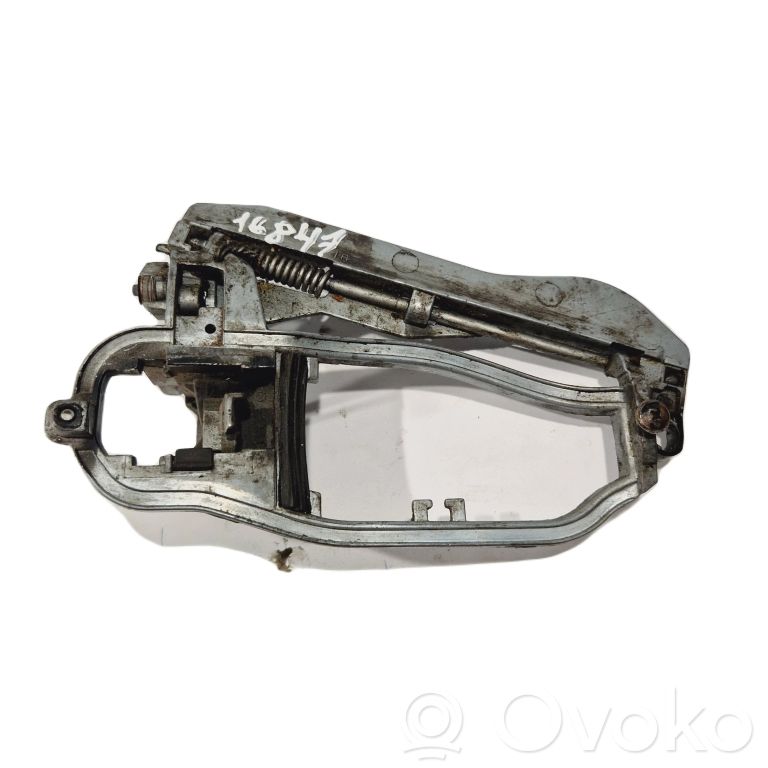 Holder/bracket for external opening handle at the front