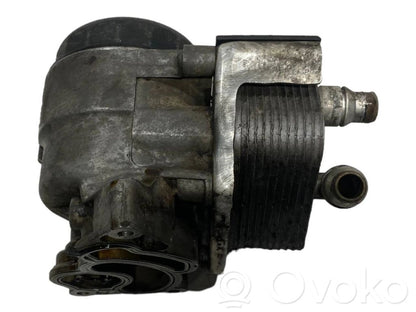 Oil filter holder/cooler