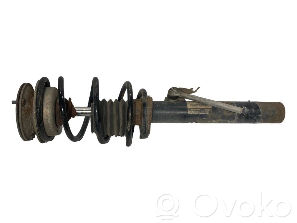 Priekšpusē amortizators ar atsperi