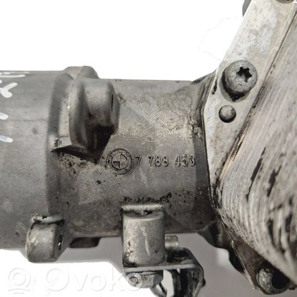 Oil filter holder/cooler