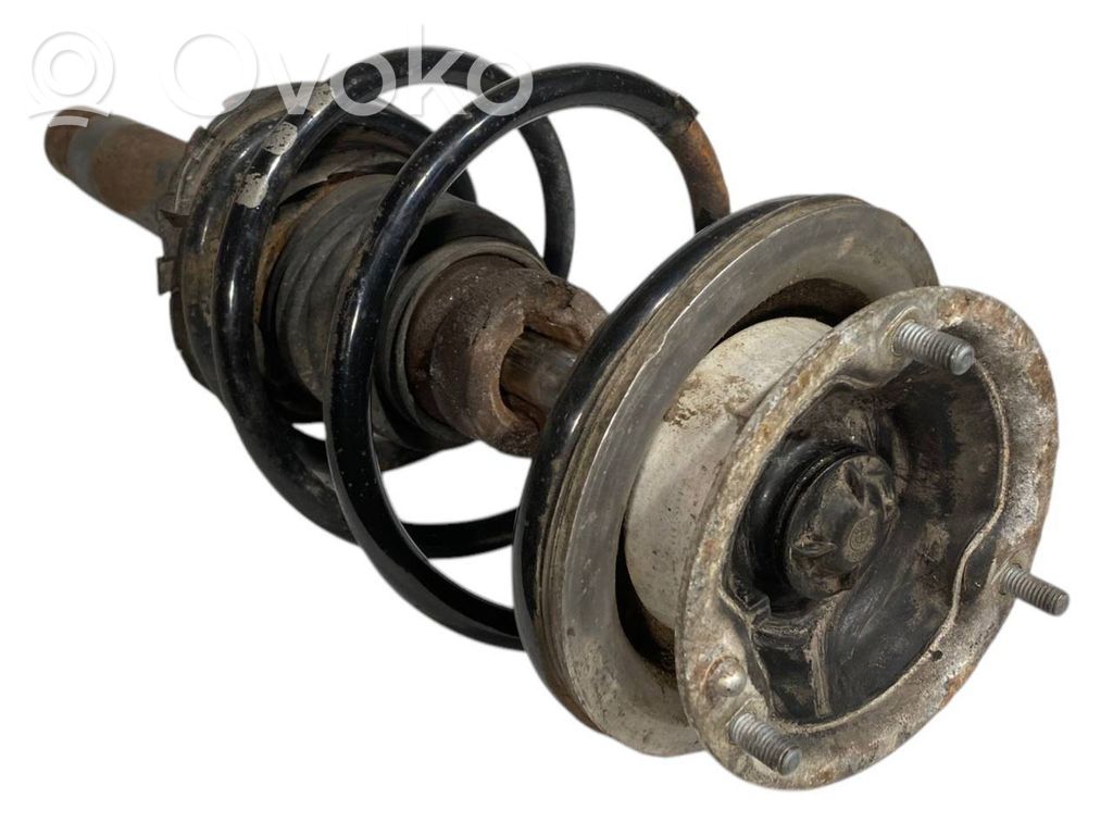 Priekšpusē amortizators ar atsperi