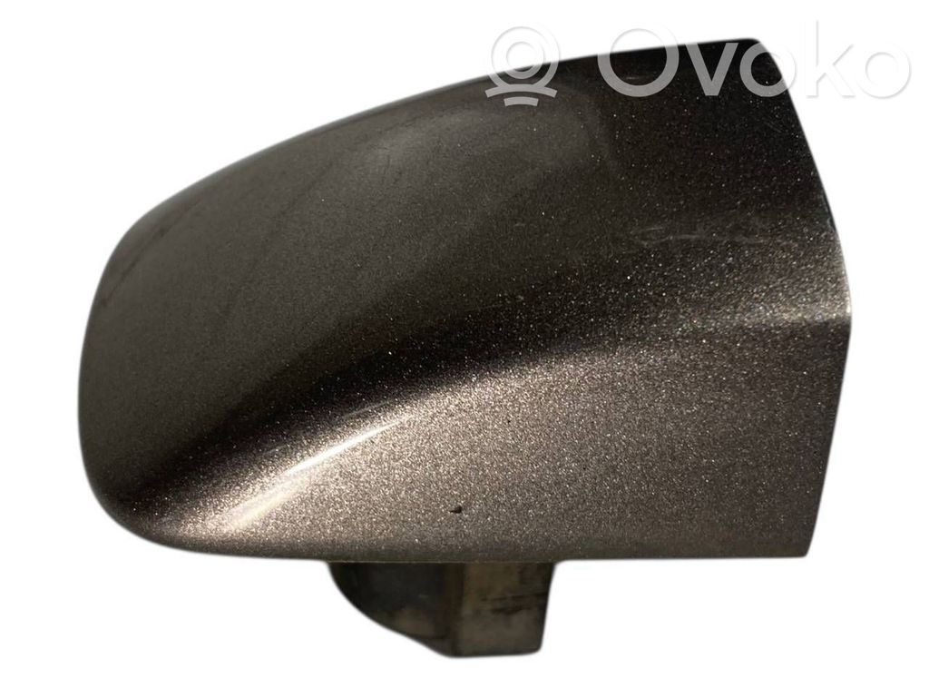 Priekšpusē durvju roktura vāciņš