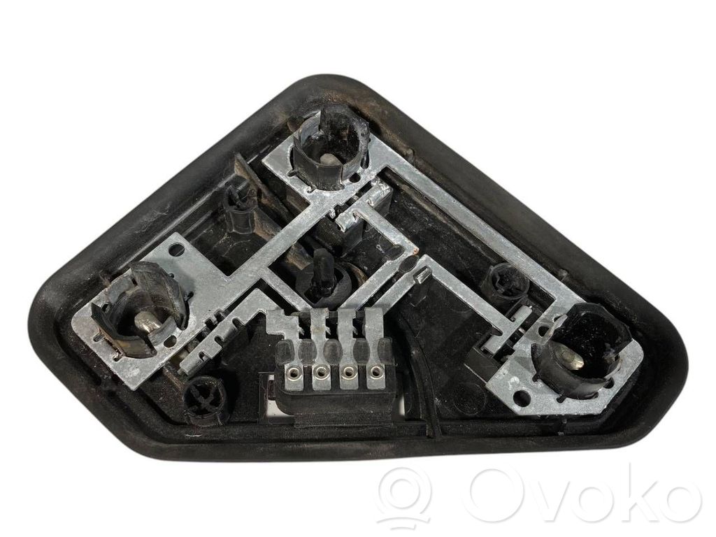 Aizmugures spuldzes vāka turētājs