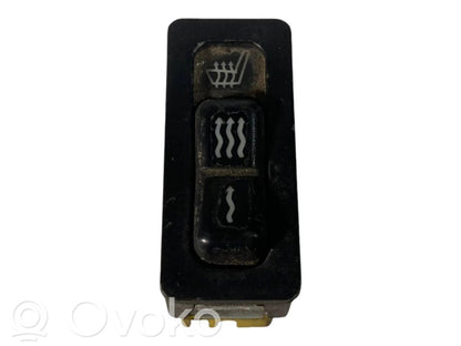 Sēdekļu apsildes slēdzis