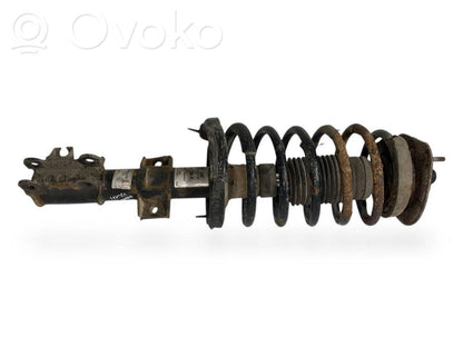 Priekšpusē amortizators ar atsperi