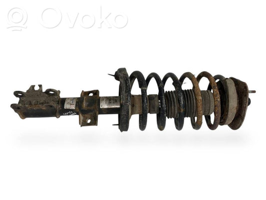 Priekšpusē amortizators ar atsperi