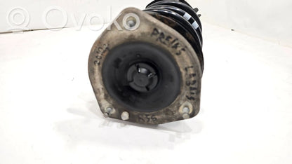 Priekšpusē amortizators ar atsperi