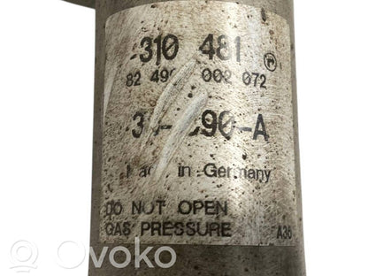 Priekšpusē amortizators ar atsperi