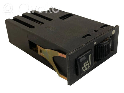 Sēdekļu apsildes slēdzis