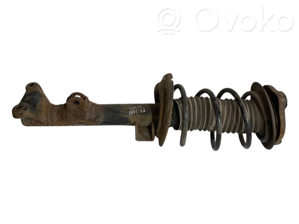 Front shock absorber with spring