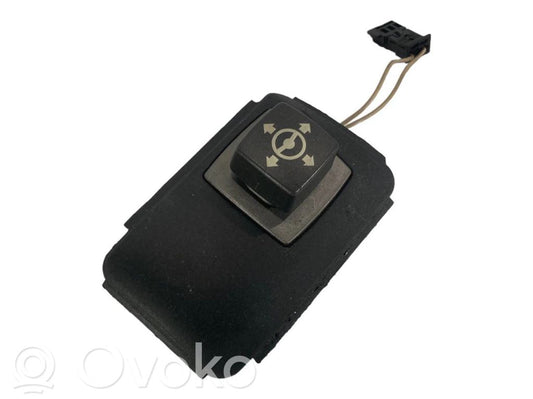 Steering wheel height control switch